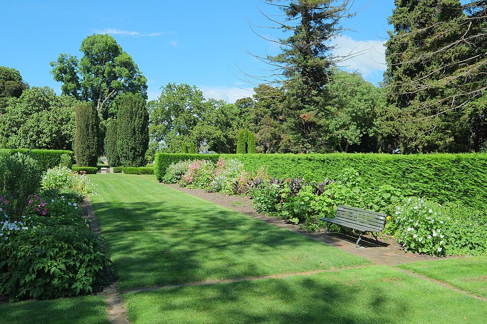 Brick borders outlining formal garden beds at Frimley Park